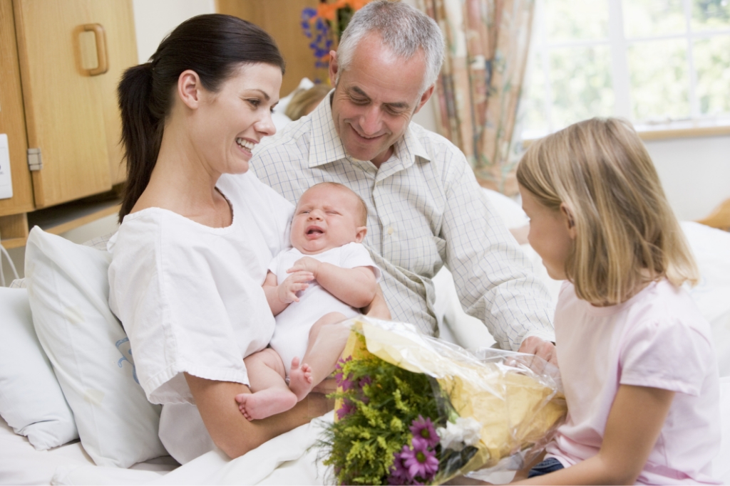 Maternity, Surgical & Paediatric Hospital The George Centre - Young family with newborn