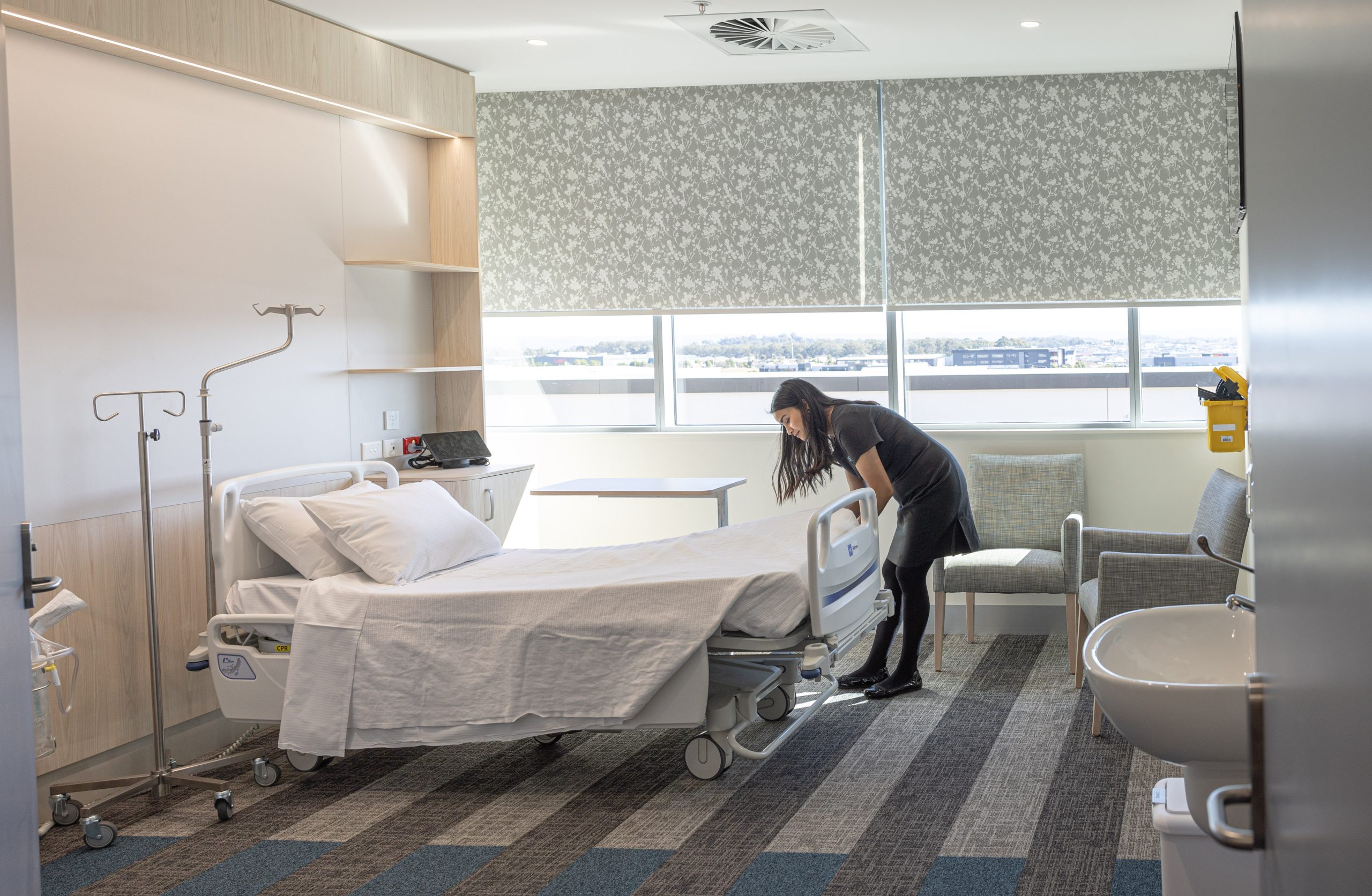 nurse making bed